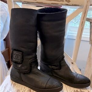 CHANEL Black leather with black fur lining 
11 inch height , size 10.5 US